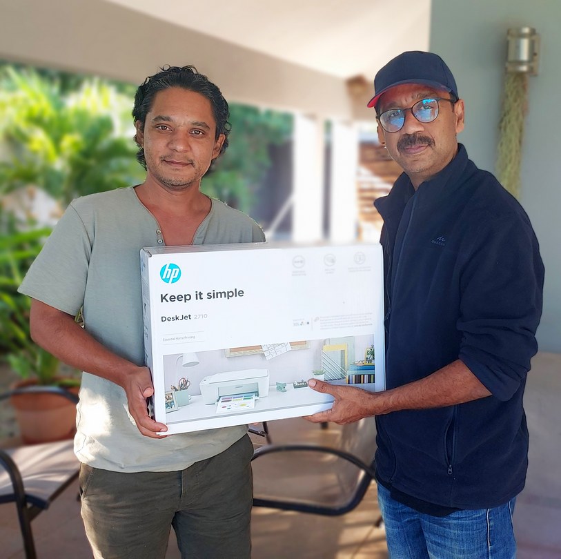 Lafaz receiving the first prize to our Photo contest about roads in Mauritius & Rodrigues