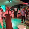 Photo exhibition at night in a restaurant in Flic en Flac