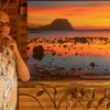 Désiré Lilyman and his reflection photo taken at Le Morne during photo exhibition
